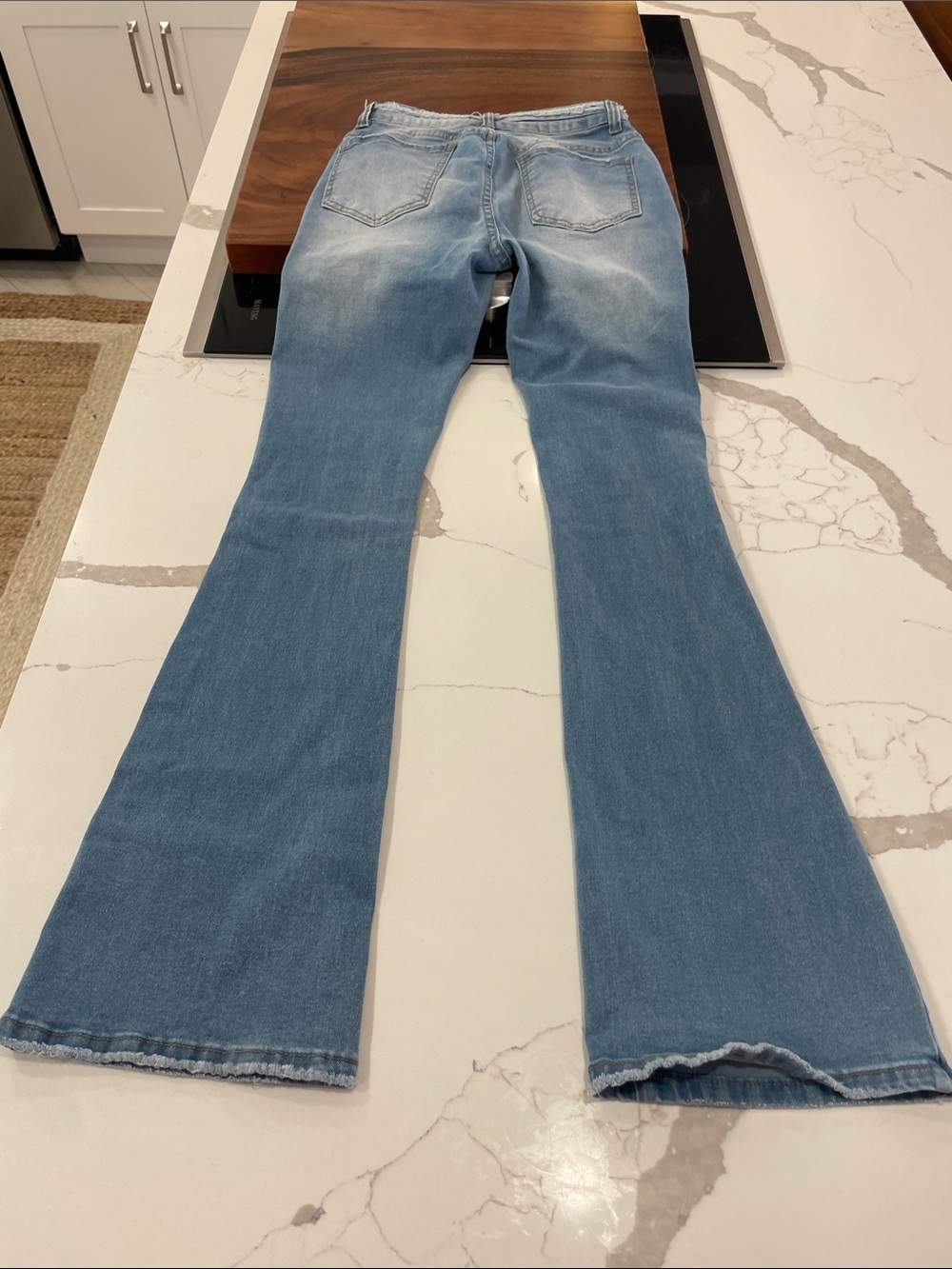 SHEIN Light Blue Distressed Flare Jeans - Picture 4 of 7